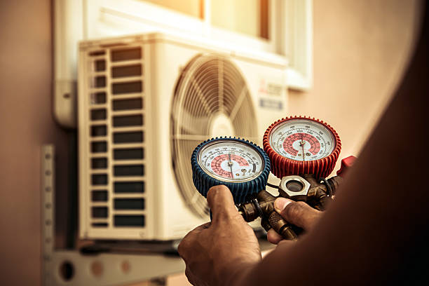 Professional Air Conditioning Service technician working in Carver, MN